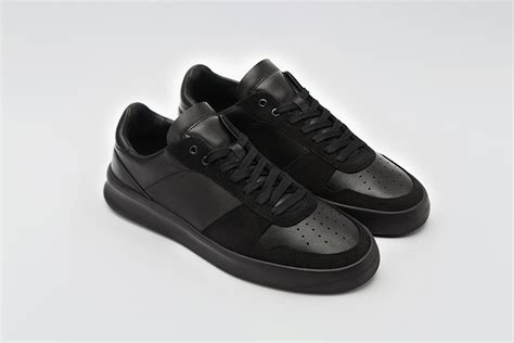 luxury black sneakers for men.